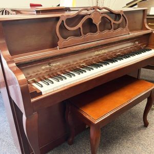 2004 Pearl River Console Piano model UP110 in Cherry Finish